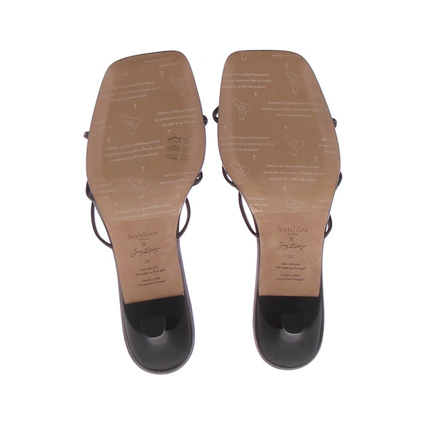 Mules noires à noeuds