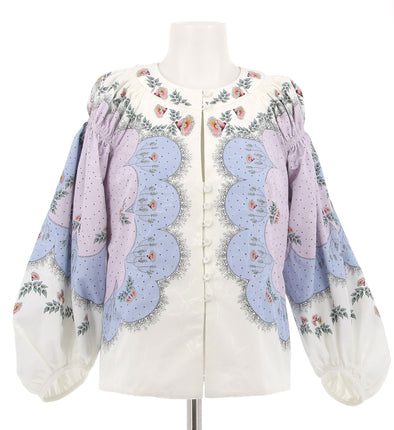 Blouse blanche à fleurs