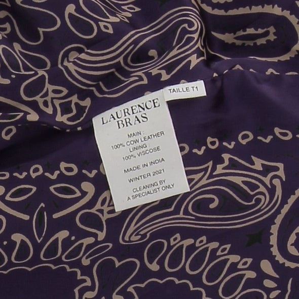 Blouson bicolore en cuir à franges