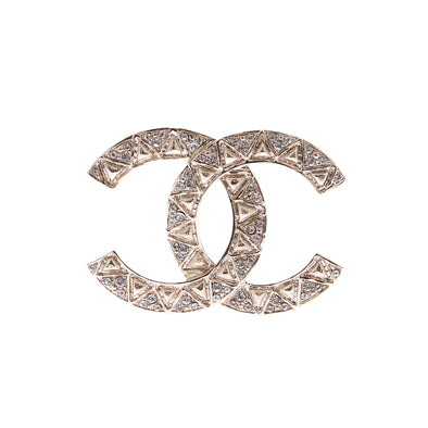 Broche "CC" dorée à strass