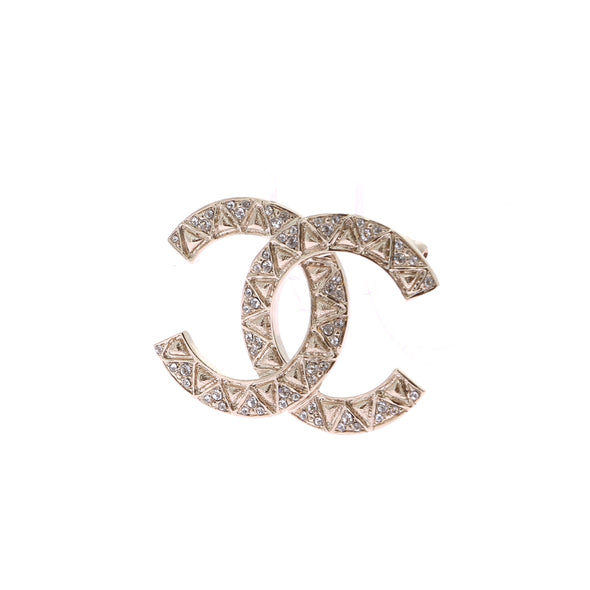 Broche "CC" dorée à strass