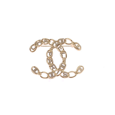 Broche CC dorée