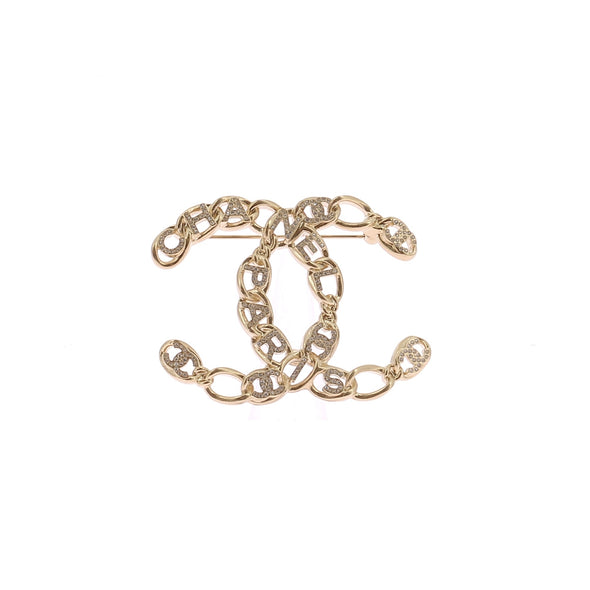 Broche CC dorée