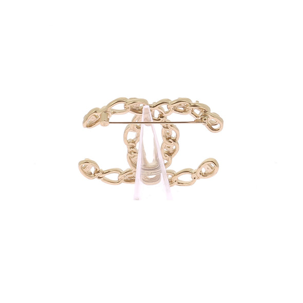 Broche CC dorée