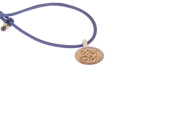 Collier bleu et plaqué or