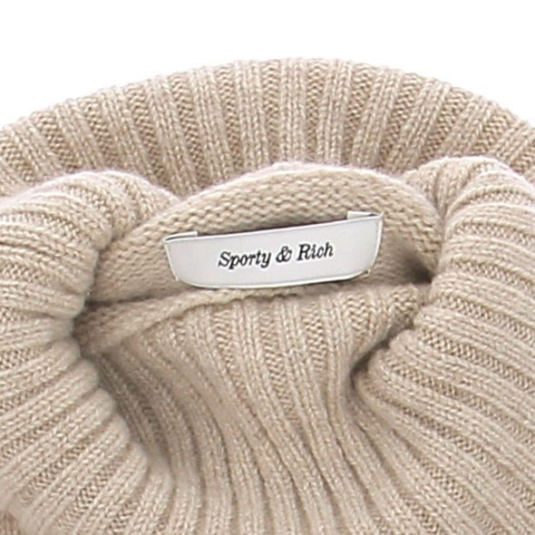 Col roulé beige en laine