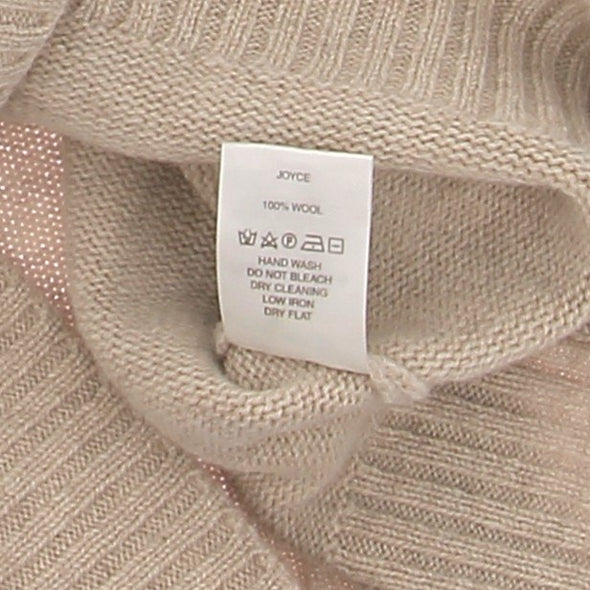 Col roulé beige en laine