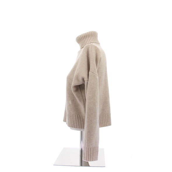 Col roulé beige en laine