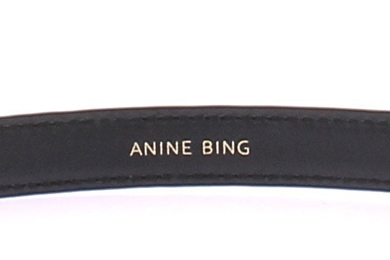 Ceinture noire à boucle dorée