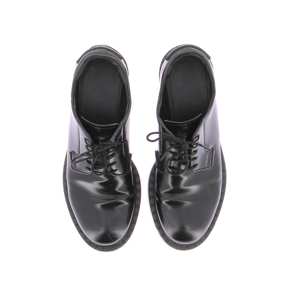 Derbies en cuir noir