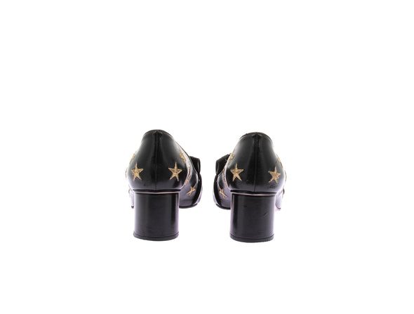 Mocassins à talons noirs en cuir
