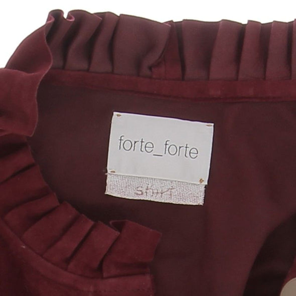 Blouse en cuir bordeaux