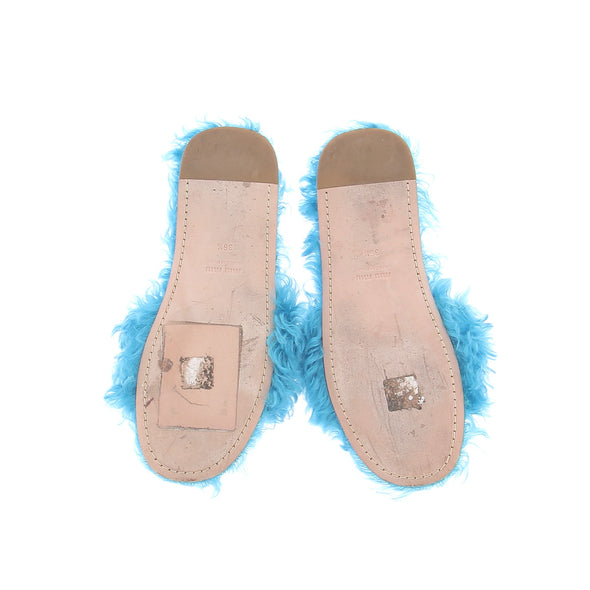 Claquettes en shearling