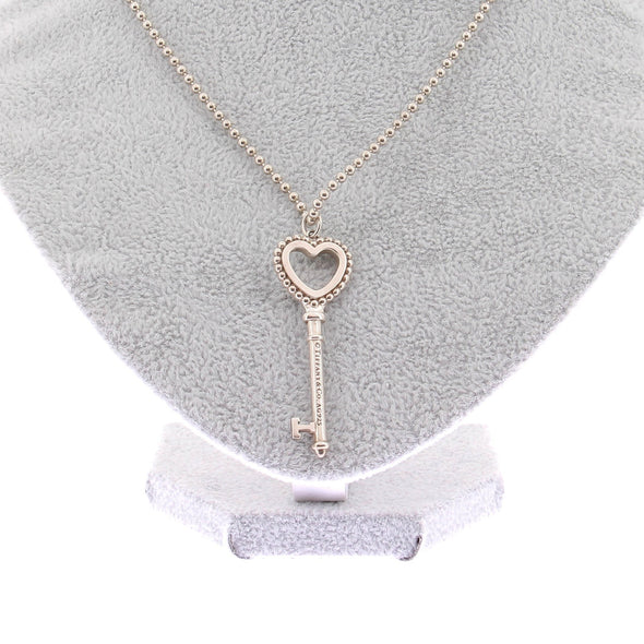 Collier pendentif Clé