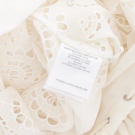 Top blanc et perles