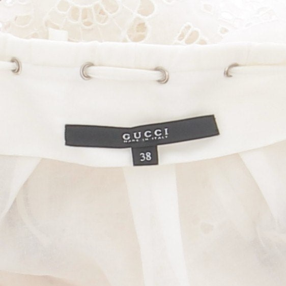 Top blanc et perles