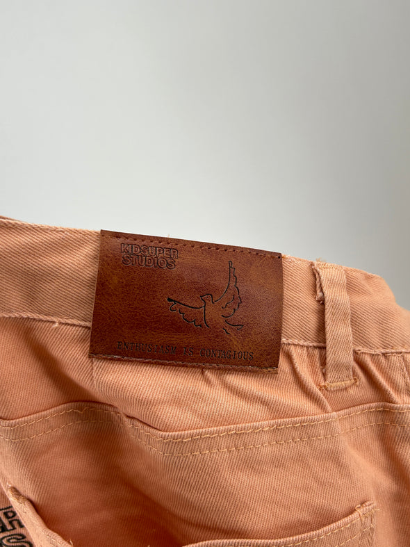 Jean orange brodé