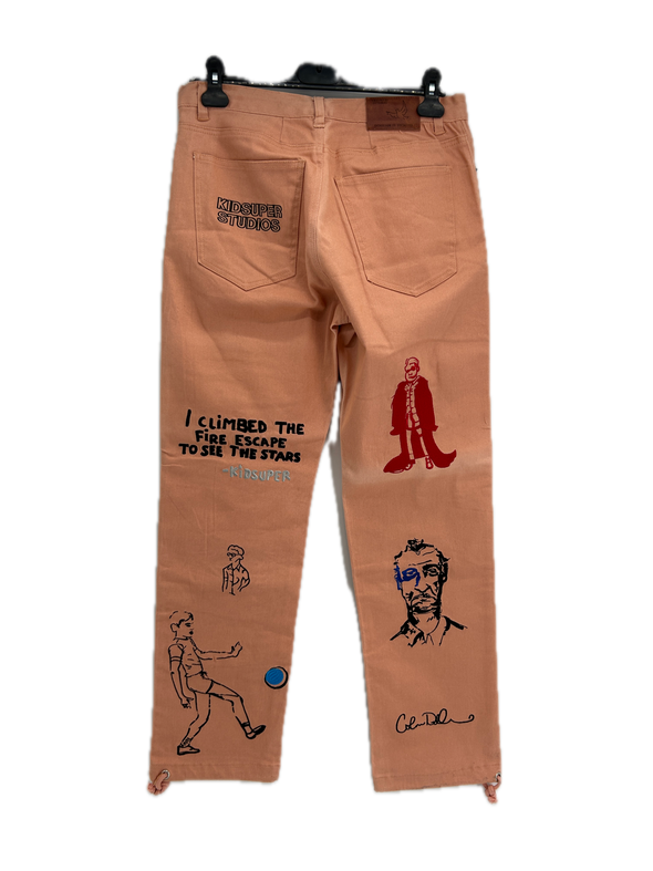Jean orange brodé