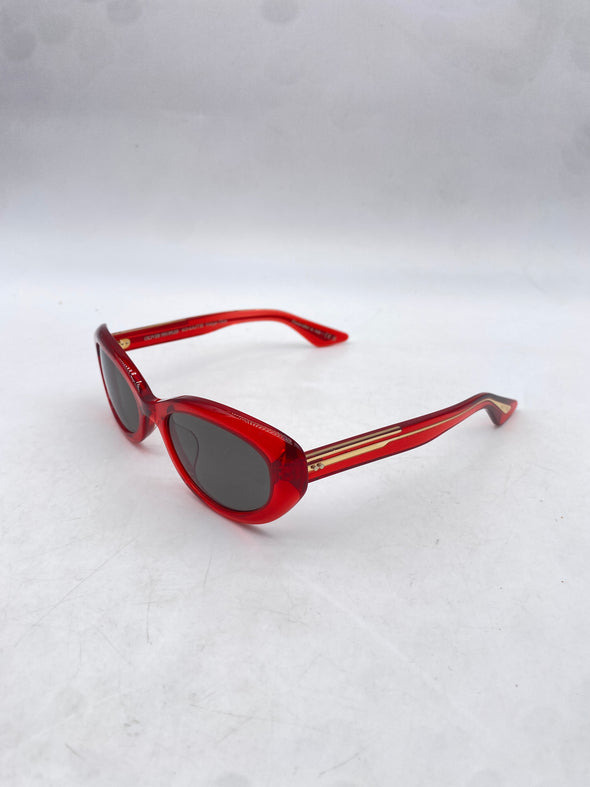 Lunettes de soleil rouges