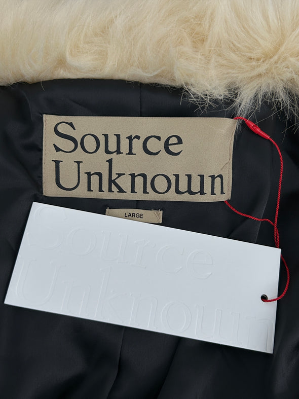 Manteau en fausse fourrure
