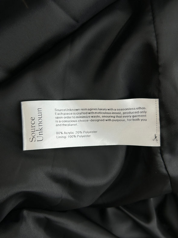 Manteau en fausse fourrure