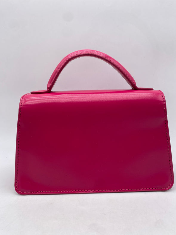 Sac à main en cuir vernis rose