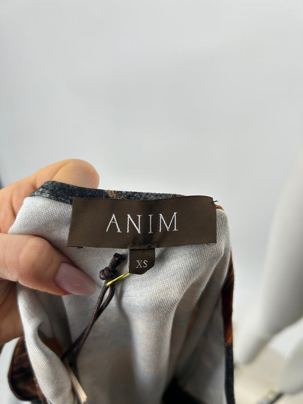 Top asymétrique