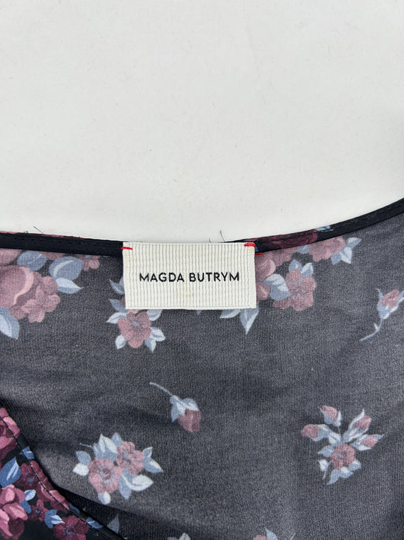 Robe noire asymétrique à motif floral