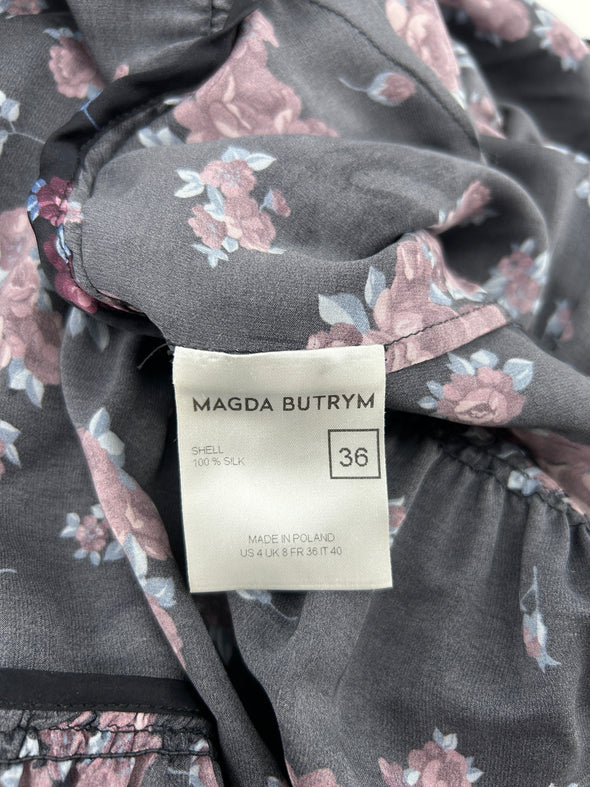 Robe noire asymétrique à motif floral