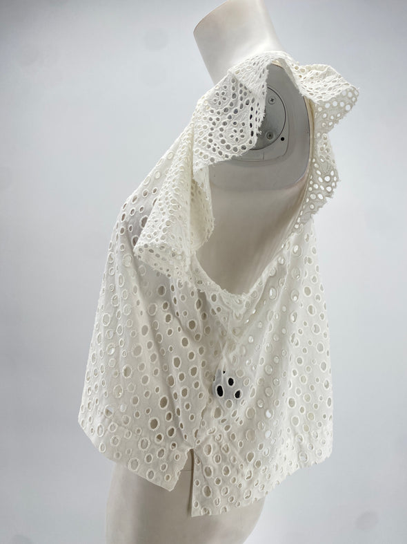 Top blanc à trous et manches volants