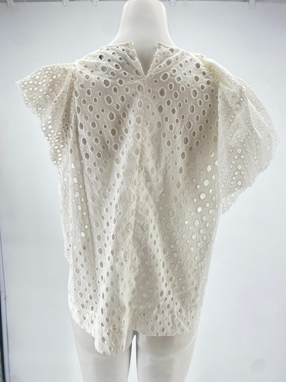 Top blanc à trous et manches volants