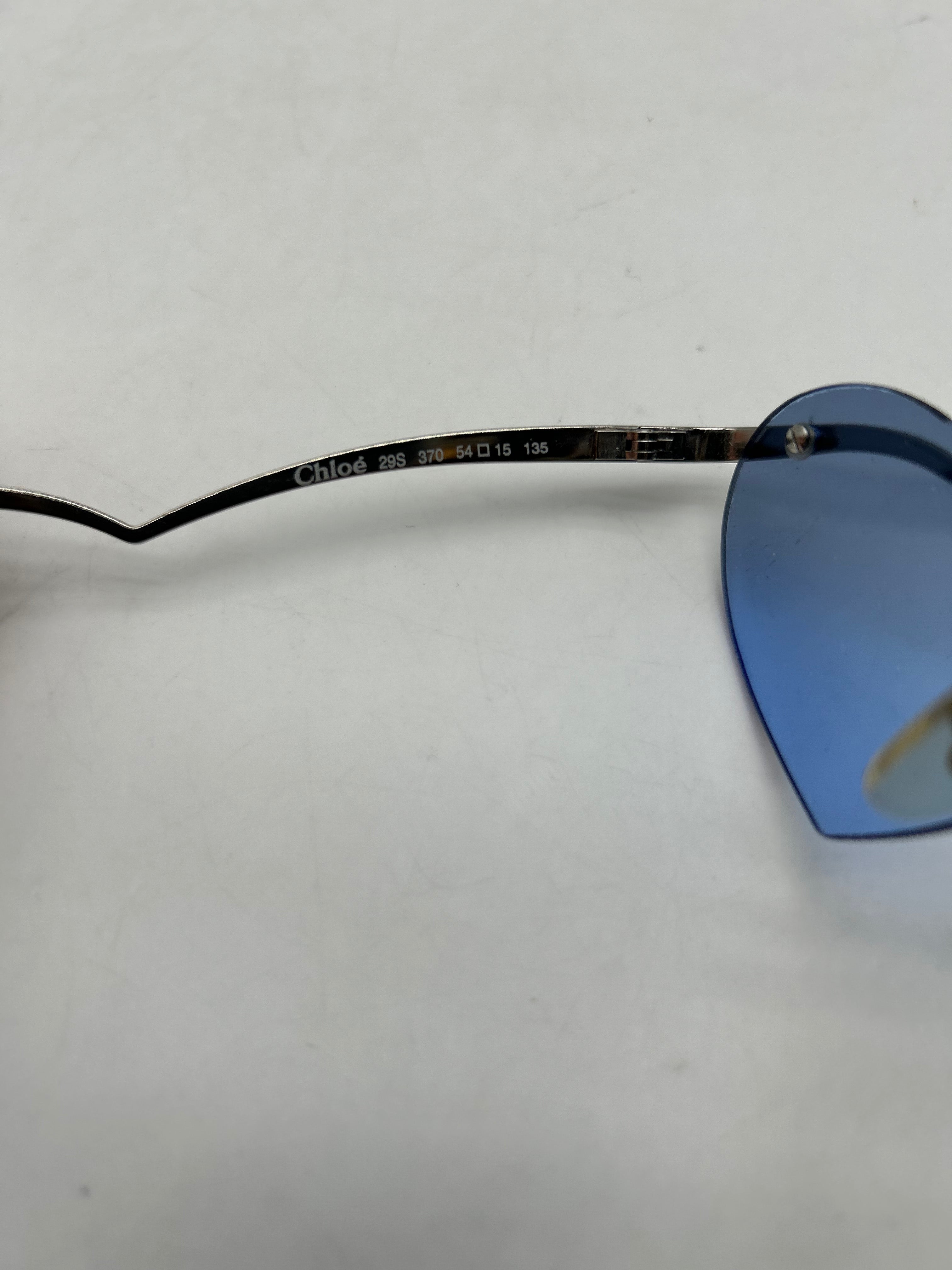 Lunettes de soleil en forme de coeur bleue Personal Seller Paris