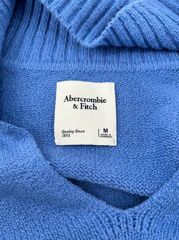 Pull bleu en maille côtelée