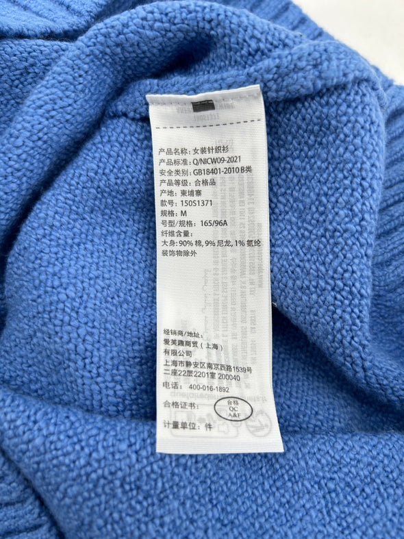 Pull bleu en maille côtelée