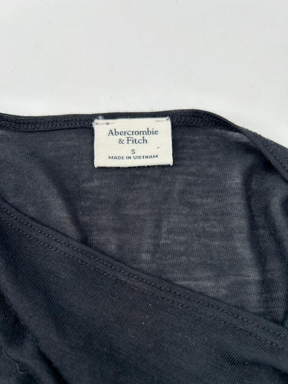 Pull noir plissé