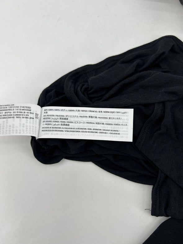 Pull noir plissé