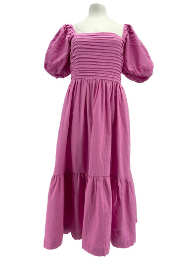 Robe rose à manches bouffantes