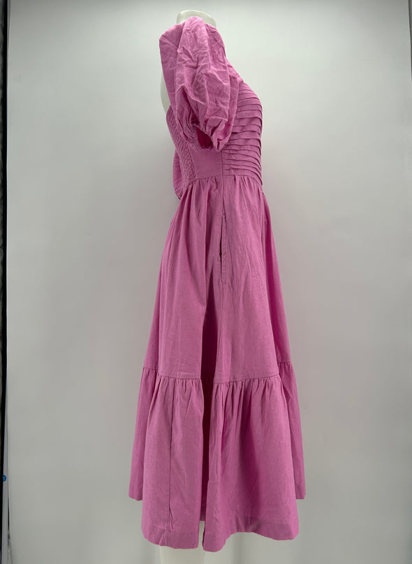 Robe rose à manches bouffantes