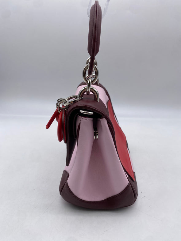 Petit sac à main "Be Dior" en cuir rose et rouge