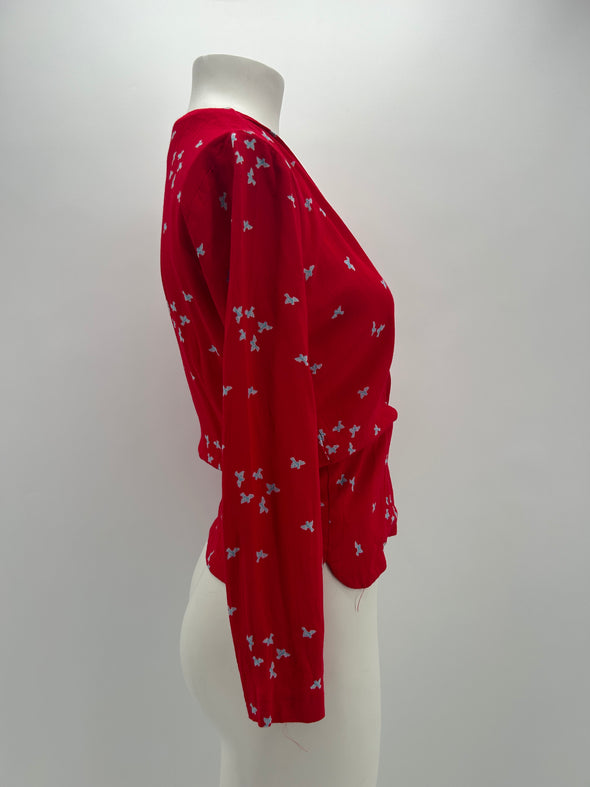 Top rouge portefeuille à fleurs