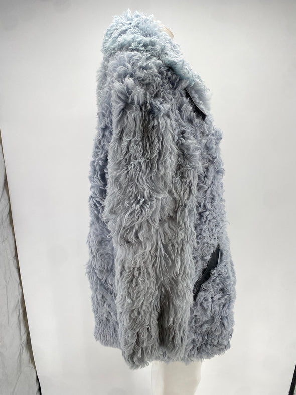 Manteau en peau lainée bleue