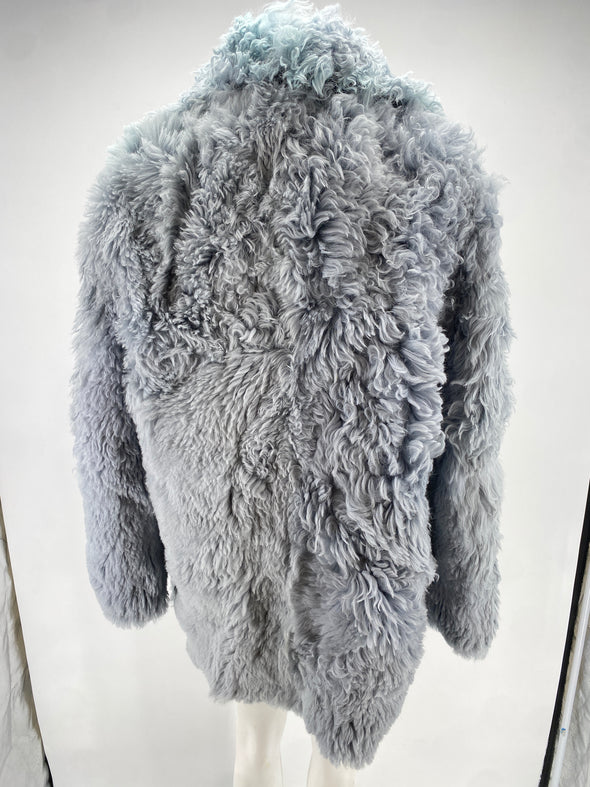 Manteau en peau lainée bleue