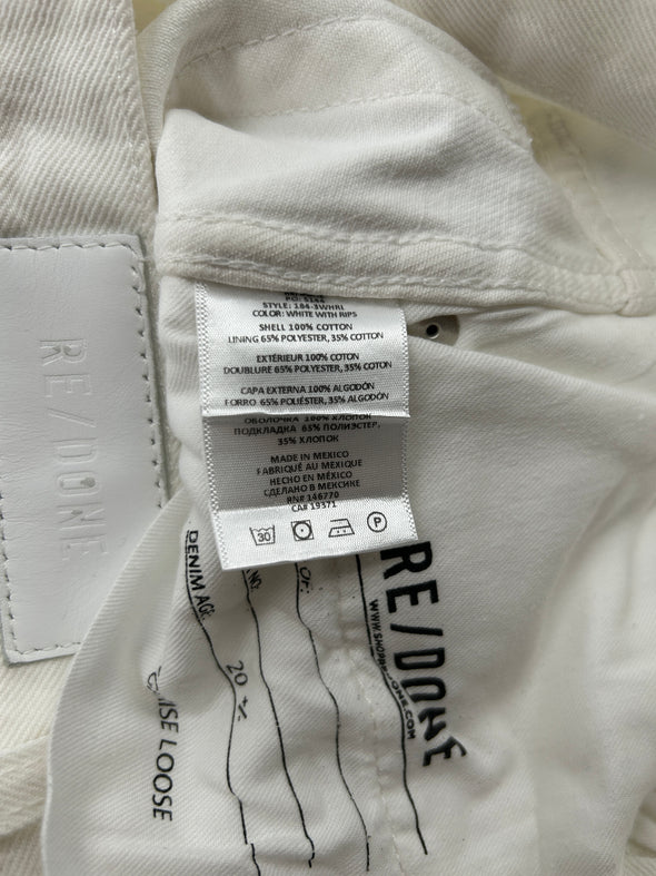 Pantalon blanc à trous