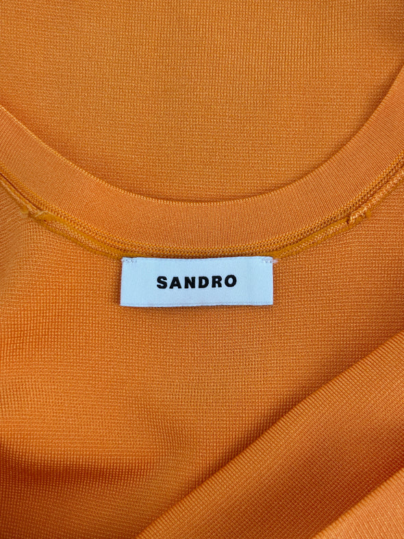 Robe orange à franges