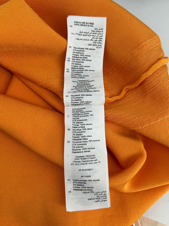 Robe orange à franges