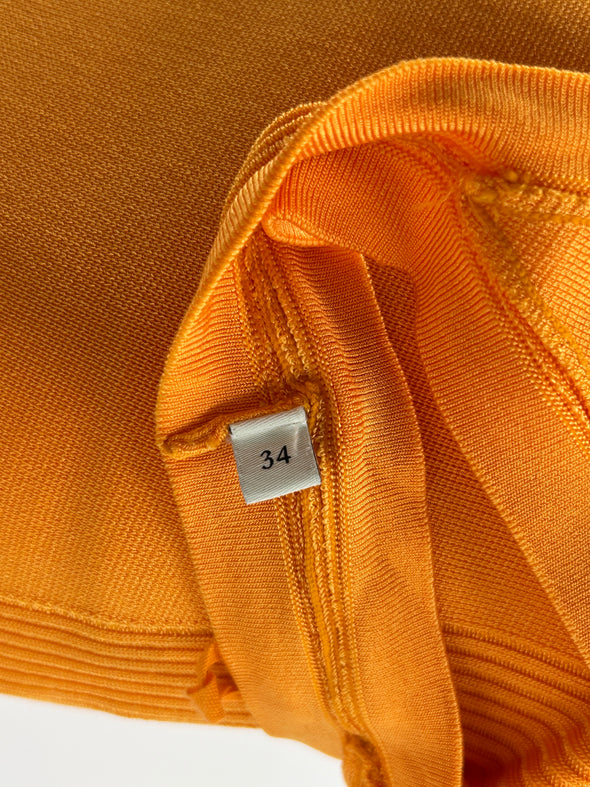 Robe orange à franges