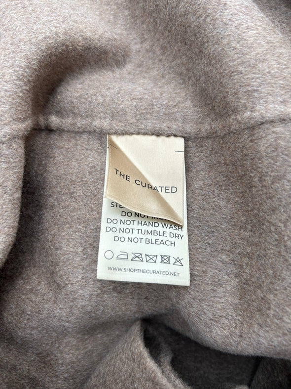 Manteau en laine avec ceinture