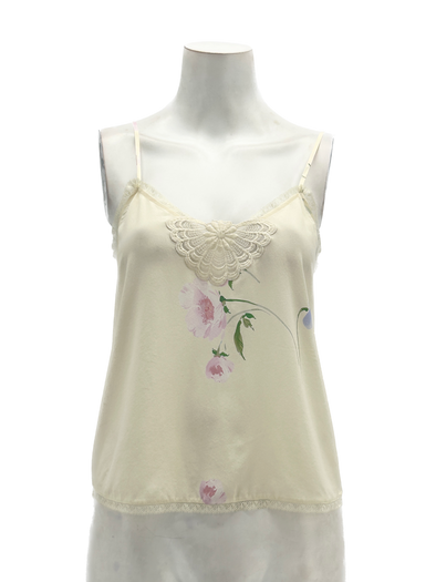 Top en soie beige à motif floral