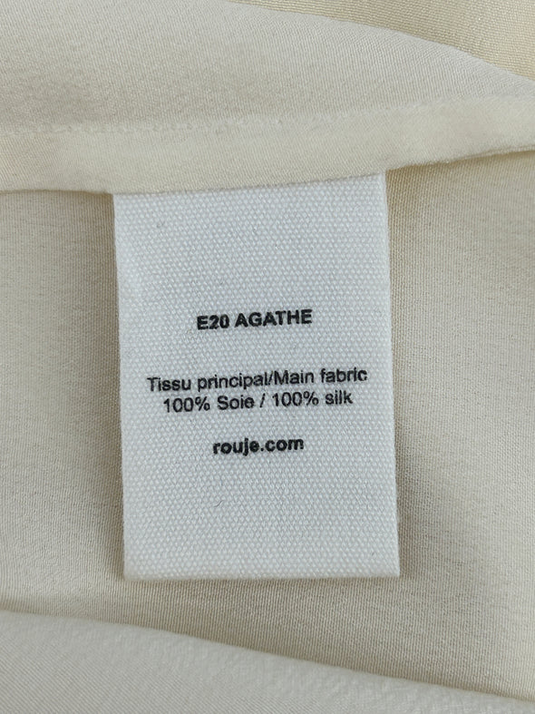 Top en soie beige à motif floral