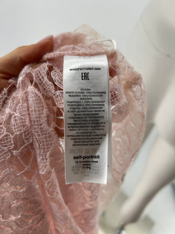 Robe rose à sequins